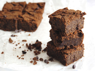 Homemade baked stack brownie pieces, close up