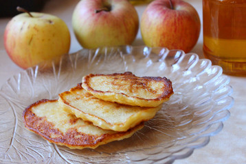 Fried pancakes with apple