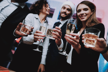 Young People Celebrating New Year in Modern Office