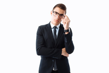 Business elegant man, in a suit and glasses, posing on a white background