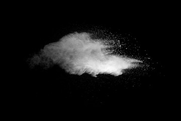 Explosion of white dust on black background. - 228710751