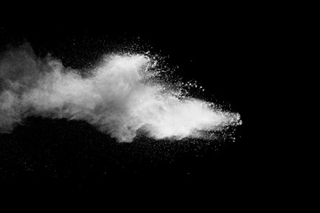 Explosion of white dust on black background. - 228710919