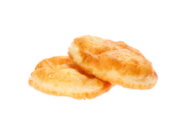 Traditional Bulgarian homemade donut like breakfast, named Mekitsa or Mekica, isolated on white background. Mekitsa is made of kneaded dough that is deep fried