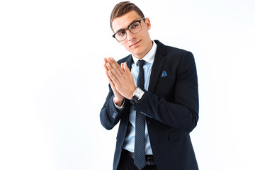 businessman in glasses and suit, rubbing his hands, Cunning handsome plans his cunning plan on a white background.
