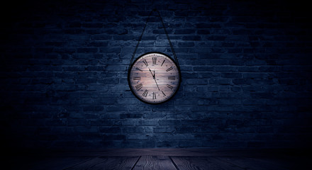 Antique clock on the old, brick wall, wooden floor, smoke, fog. Dark gloomy background of empty room.