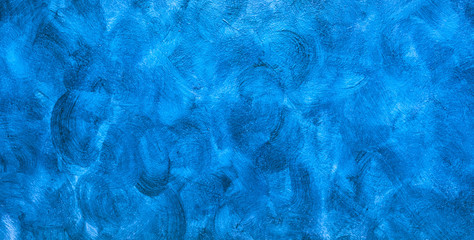 Creative blue background with abstract painting.