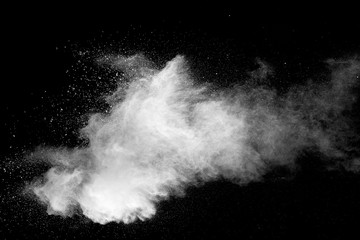 Explosion of white dust on black background. - 228714739