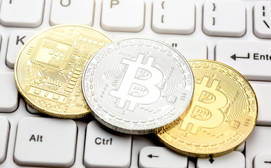 Bitcoin on computer keyboard
