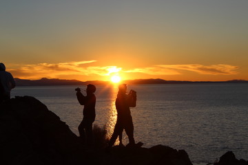 Fototapeta premium silhouette of man at sunset