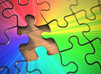 Colored puzzle with one missing piece. Lack of the part that gives rise to the colors.