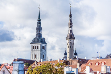 Cityscape of Talinn, with a view from the town wall on St Olaf Baptist  Chruch and CHurch of the Holy spirit in the old town of Tallinn in Estonia