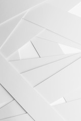 Low geometric composition with white elements, abstract background