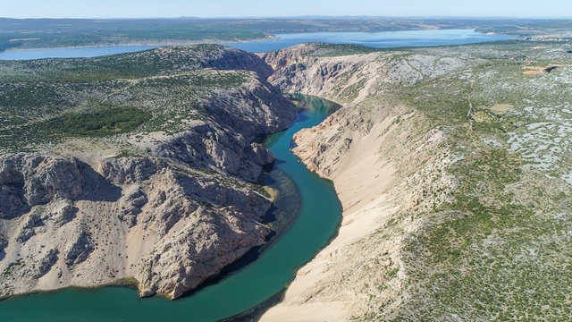 Zrmanja River in northern Dalmatia, Croatia is famous for its crystal clear waters and countless waterfalls surrounded by a deep canyon. This was a site of winnetou filming.