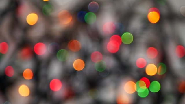 Defocused bokeh lights background. Abstract sparkles