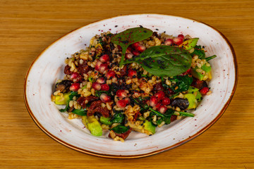Vegan tabule with tomato and avocado