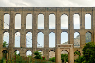 Obraz premium The Aqueduct of Vanvitelli, also called Caroline Aqueduct, was built in the 18th century to supply the Royal Palace of Caserta with water.