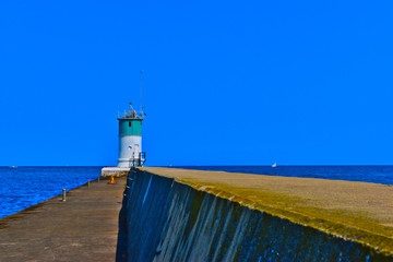 lighthouse on coast of sea
