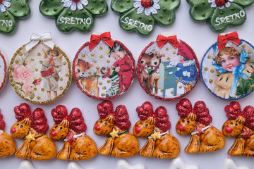 Stall with decorations for winter holidays at traditional annual Christmas market in Zagreb, Croatia on November 30, 2016.