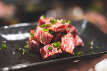 Beef diced for charcoal grills or Japanese style yakiniku. (vintage tone)