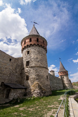 Fototapeta na wymiar Tower of old castle in kamianets-podilskyi