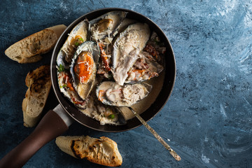 Mussels with Blue Cheese Sauce and Garlic Baguette.