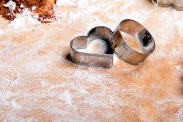 Preparing Christmas cookies. Cookies ingredients, copy space. Heart shape