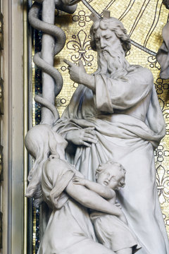 Moses lifts up the brass serpent, altar of the Holy Cross in Zagreb cathedral dedicated to the Assumption of Mary 