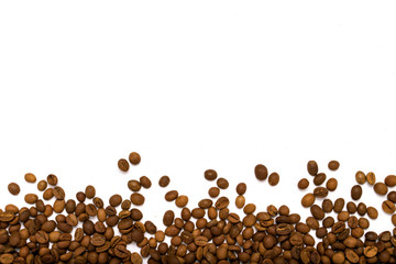 Coffee grains in the bottom of the image on a isolated white bac
