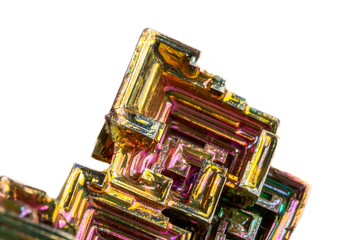 Macro of the mineral bismuth stone on a white background