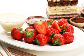 Fondue with Melting chocolate or melted chocolate and strawberry.