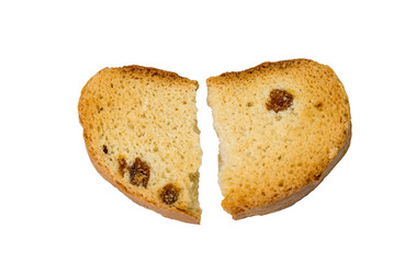 dry broken bread with raisins on a white background