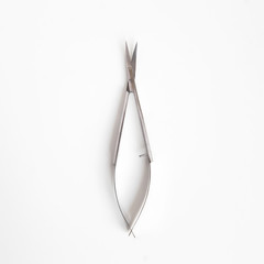 Makeup artist and eyebrow tools. Scissors, forceps and mask. Cut out the background and Flatley.