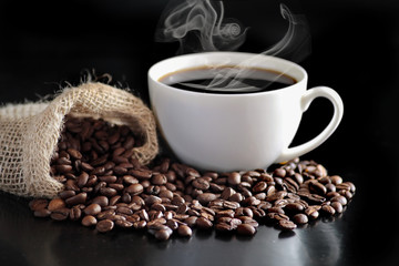 Cup of coffee on black background
