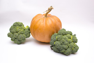 Broccoli cabbage isolated, pumpkin on white background. Autumn vegetables, harvest