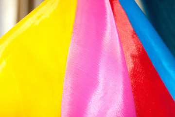 Beautiful bright multicolored silk fabric folded.
