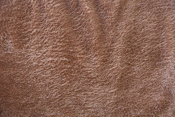 brown texture of fur fabric on clothes