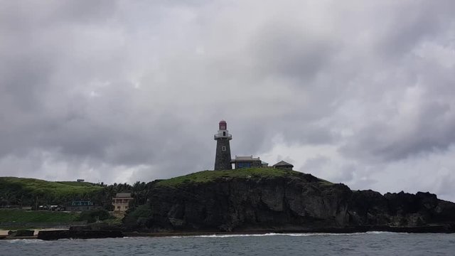Revolving around a lighthouse at the edge of the island in Batanes, Philippines