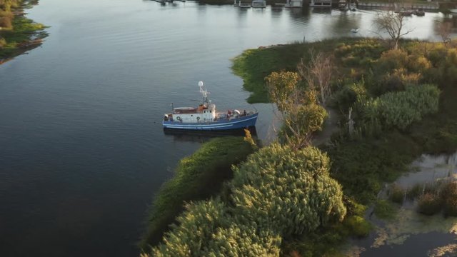 Aerial video of Old abandoned  Boat in Delta water in Northern California