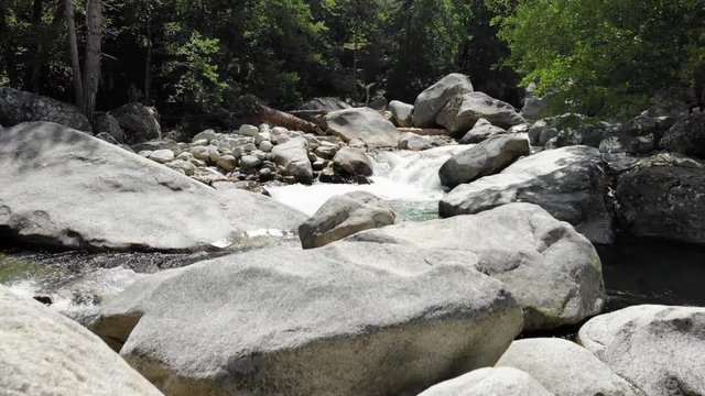 Low Drone Footage over a River in the Mountains of Corsica, France
