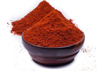 red chili powder isolated on white background 