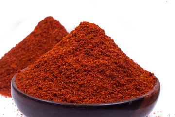 red chili powder isolated on white background 