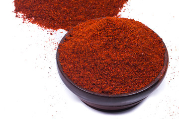 red chili powder isolated on white background 