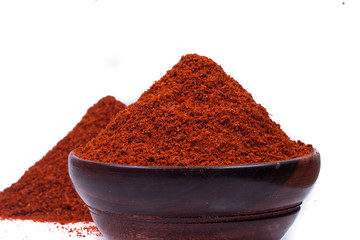 red chili powder isolated on white background 