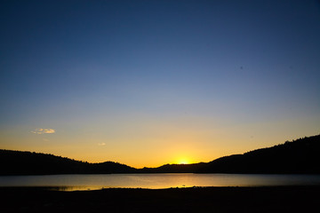 Sunset on Lake in Rocky Mountains