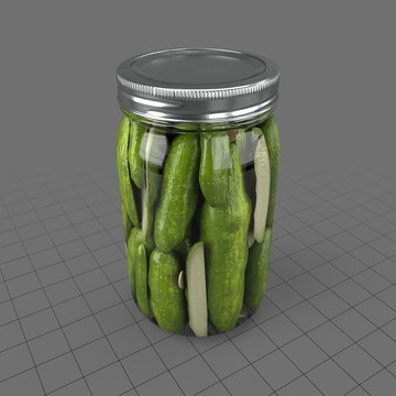 Jar filled with pickled cucumbers
