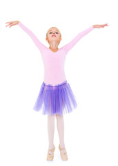 Naklejka premium Little girl ballerina performs dance.