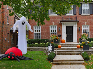 Halloween decorations in front yard of a house