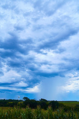 Fototapeta na wymiar Dark Storm Clouds with Water Tower