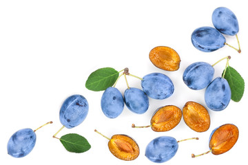 plums with leaf isolated on a white background with copy space for your text. Top view. Flat lay pattern