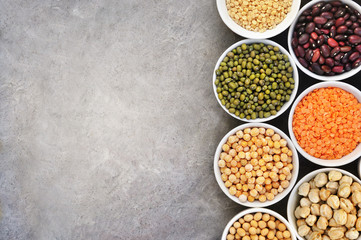 Mix of dry legume varieties: pinto and mung beans, assorted lentils, soyabean, yellow and green peas, chickpea; vegan high protein food for healthy diet